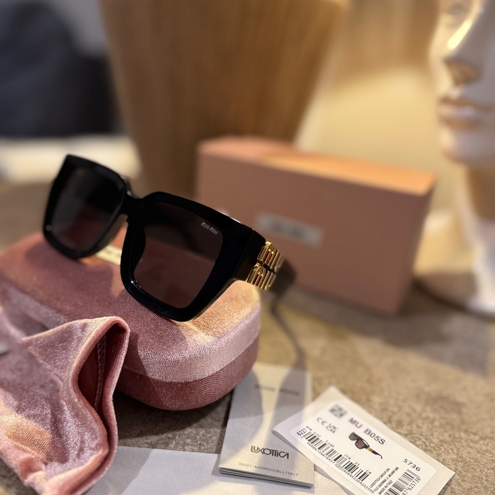 Miu Miu Black Sunglasses with Gold Detail